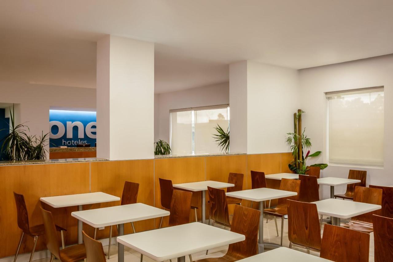 One Puebla Finsa Hotel Exterior photo