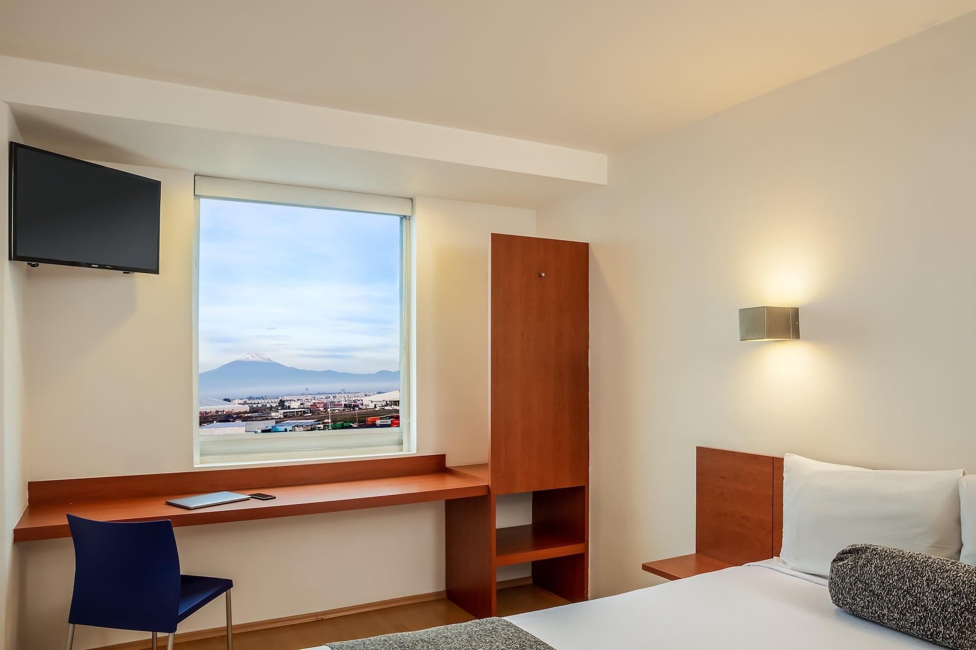 One Puebla Finsa Hotel Exterior photo