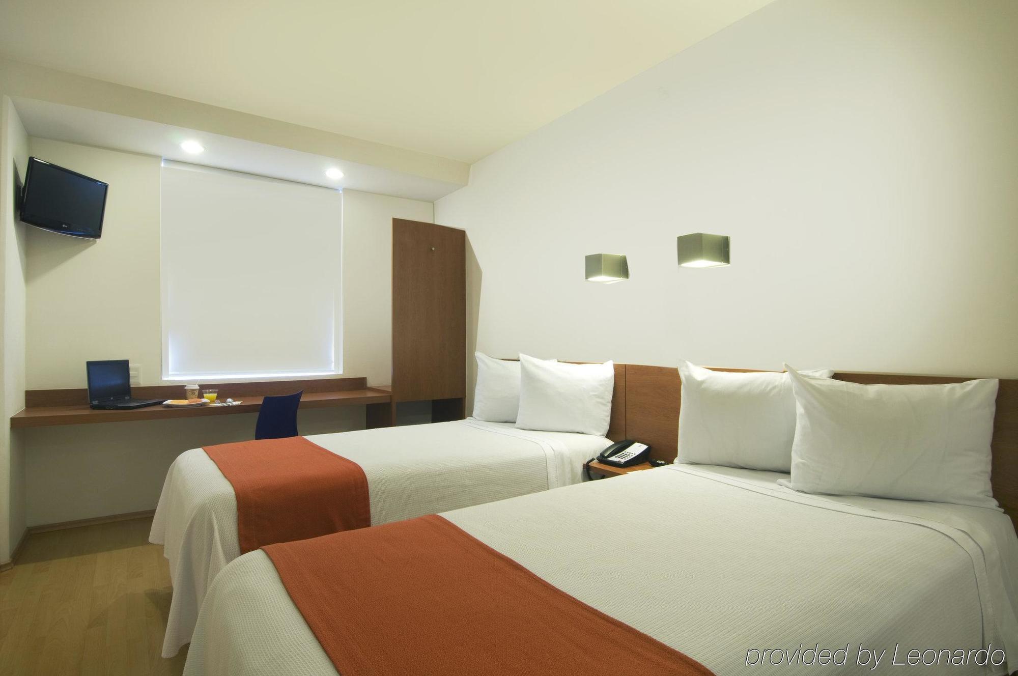 One Puebla Finsa Hotel Exterior photo